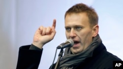 FILE - Alexey Navalny speaks during a rally in Moscow, Dec. 24, 2011. 