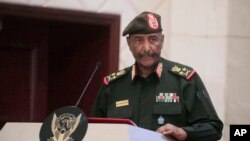 FILE - Sudan's Army chief Gen. Abdel-Fattah Burhan speaks in Khartoum, Dec. 5, 2022. Burhan survived a drone attack, July 30, 2024, on an army graduation ceremony he was attending in the country's east, the military said.