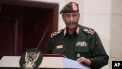 FILE - Sudan's Army chief Gen. Abdel-Fattah Burhan speaks in Khartoum, Sudan, Dec. 5, 2022. Burhan has reportedly agreed to a face-to-face meeting with Gen. Mohammed Hamdan Dagalo as part of efforts to establish a truce and initiate political talks.