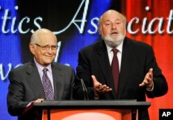 FILE - Norman Lear, left, and Rob Reiner accept the Heritage Award for the classic television series "All in the Family" at the 2013 TCA Awards at the Beverly Hilton Hotel in California, Aug. 3, 2013.