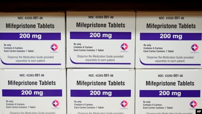 FILE - Boxes of the drug mifepristone sit at the West Alabama Women's Center in Tuscaloosa, Alabama, March 16, 2022. CVS Health and Walgreens plan to start dispensing the abortion pill mifepristone in a few states within weeks, officials for both drugstore chains said this week.