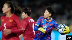 Vietnam's goalkeeper Thi Kim Thanh Tran looks to throw the ball to teammates during the New Zealand and Vietnam warm up match ahead of the women's World Cup in Napier, New Zealand, July 10, 2023.