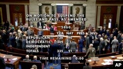 This image from House Television shows the U.S. House of Representatives passing, on a 335-91 vote, a 45-day funding bill at the Capitol in Washington, Sept. 30, 2023. The Senate then passed the measure before sending it to President Joe Biden to sign. (House Television via AP)