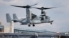 FILE - A Marines Osprey lands aboard the USS Somerset, Feb. 27, 2014, in Philadelphia.