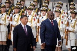 Republic of Congo's President Felix Tshisekedi, right, and Chinese President Xi Jinping attend a welcoming ceremony at the Great Hall of the People in Beijing, China, May 26, 2023.