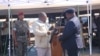 Filipe Nyusi, Presidente de Moçambique, e Ossufo Momade, presidente da Renamo, cerimónia de encerramento da última base da antiga guerrilha