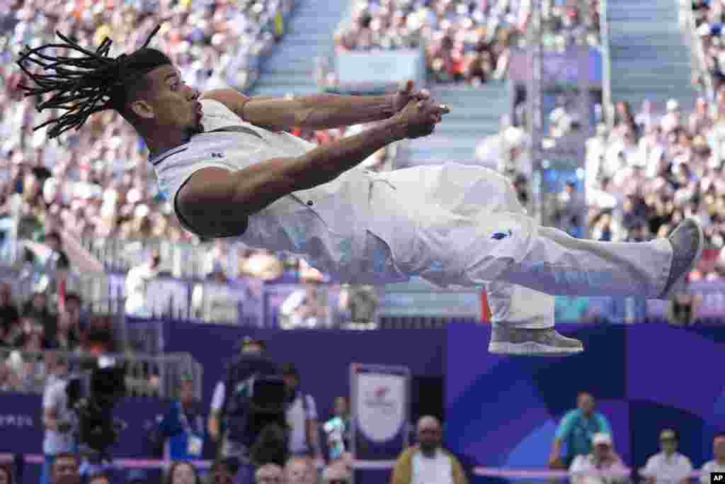 France's Gaetan Alin, known as B-Boy Lagaet competes during the B-Boys round robin battle for the breaking competition at La Concorde Urban Park at the 2024 Summer Olympics, Aug. 10, 2024, in Paris, France. 