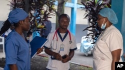 Medical staff talk to one other at the general hospital in Goma, Democratic Republic Of Congo on Aug. 14, 2024, after the World Health Organization declared the mpox outbreaks in Congo and elsewhere in Africa a global emergency. 