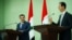 Syria's President Bashar al-Assad and Iraqi Prime Minister Mohammed Shia Al-Sudani attend a news conference, in Damascus, Syria July 16, 2023. (Iraqi Prime Minister's Media Office/Handout via Reuters) 