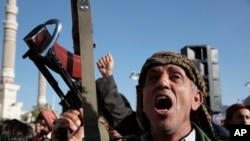 Houthi supporters attend a rally in support of the Palestinians in the Gaza Strip and against the U.S.-led airstrikes on Yemen, in Sanaa, Yemen, Jan. 26, 2024.