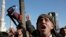 Houthi supporters attend a rally in support of the Palestinians in the Gaza Strip and against the U.S.-led airstrikes on Yemen, in Sanaa, Yemen, Jan. 26, 2024.