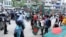 FILE - Protesters demanding resignation of Prime Minister Sheikh Hasina gather in a sit-in protest in Dhaka, July 29, 2023, as the police are trying to disperse them. 
