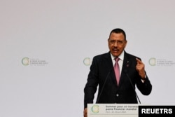 FILE - President of Niger, Mohamed Bazoum delivers a speech during the opening session of the New Global Financial Pact Summit at the Palais Brogniart in Paris, France on June 22, 2023.