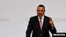 FILE - President of Niger, Mohamed Bazoum delivers a speech during the New Global Financial Pact Summit at the Palais Brogniart in Paris, France on June 22, 2023.