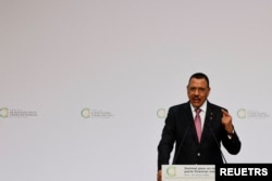 FILE - President of Niger, Mohamed Bazoum delivers a speech during the opening session of the New Global Financial Pact Summit at the Palais Brogniart in Paris, France on June 22, 2023.