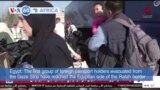 VOA60 Africa - First group of foreign passport holders evacuated from Gaza to Egypt