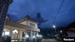 Mount Marapi volcano spews volcanic ash as seen from Nagari Batu Palano in Agam, West Sumatra province, Indonesia, Dec. 3, 2023. (Antara Foto/Iggoy el Fitra/via Reuters)