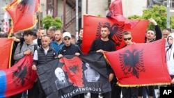 Ethnic Albanians take part in a protest in the southern, ethnic Albanian-dominated part of Mitrovica, Kosovo, June 1, 2023. 