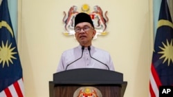 FILE - In this photo provided by the Prime Minister Office, Malaysia's Prime Minister Anwar Ibrahim speaks in Putrajaya, Malaysia, Nov. 25, 2022.