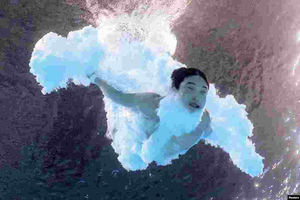 Woo Haram of South Korea competes in the men&#39;s 3m springboard final diving race at Aquatics Center in Saint-Denis, France, during the Paris 2024 Olympics.