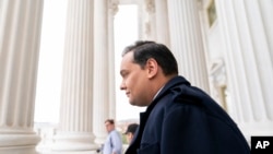 Rep. George Santos (R-N.Y.), leaves the Capitol in Washington after being expelled from the House of Representatives on Friday, December 1, 2023.