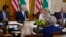 India's Prime Minister Narendra Modi speaks during a meeting with President Joe Biden and U.S. and Indian business leaders at the White House, June 23, 2023, in Washington. At left are Sundar Pichai, CEO of Google, and Tim Cook, CEO of Apple. 
