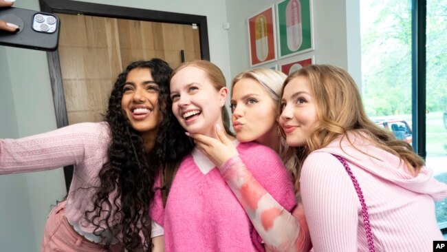 This image released by Paramount Pictures shows, from left, Avantika, Angourie Rice, Renee Rapp and Bebe Wood in a scene from