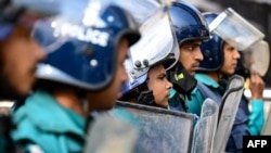 Police stand guard at the National Mosque during Friday prayers ahead of the upcoming general elections, in Dhaka, Bangladesh, on Jan. 5, 2024.