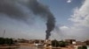 FILE - Smoke rises over Khartoum, Sudan, June 8, 2023, as fighting between the Sudanese army and paramilitary Rapid Support Forces continues. A 24-hour cease-fire was to begin June 10.