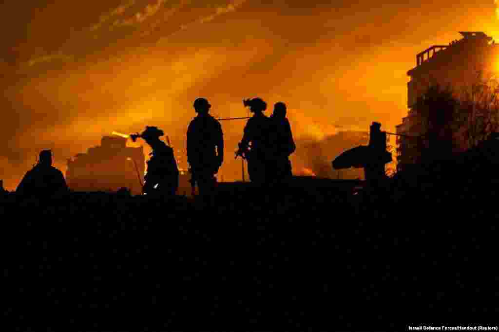 Israeli soldiers take part in an operation in a location given as the Port of Gaza.