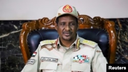 FILE - General Mohamed Hamdan Dagalo, Deputy Head of the Sudan Transitional Military Council, attends the signing ceremony of the agreement on peace and cease-fire in Juba, South Sudan, October 21, 2019.