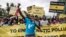 Climate activists chant slogans and hold banners as they march to demand drastic reduction in global plastic production ahead of the third meeting of the Intergovernmental Negotiating Committee (INC-3) in Nairobi, Kenya on Saturday November 11, 2023. 