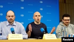 Vladimir Kara-Murza, Andrei Pivovarov and Ilya Yashin hold a press conference in Bonn, Germany, after being freed in a multi-country prisoner swap Aug. 2, 2024.