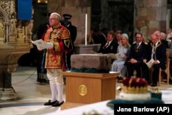 FILE - Lord Lyon King of Arms Joseph Morrow and the Stone of Scone at St Giles' Cathedral, July 5, 2023, in Edinburgh. (Jane Barlow/Pool photo via AP, File)