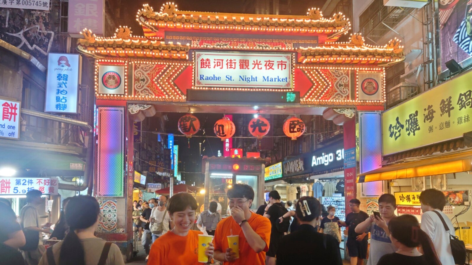 FILE - People go to the night market to shop in Taipei on June 29, 2023.