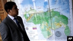 Venezuela's new map that includes the Essequibo territory as its own is displayed at the Foreign Ministry in Caracas, Venezuela, Dec. 11, 2023. 