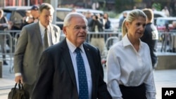 FILE - Democratic U.S. Sen. Bob Menendez of New Jersey and his wife, Nadine Menendez, arrive at the federal courthouse in New York, Sept. 27, 2023.