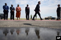 U.S. Secretary of State Antony Blinken walks toward his airplane for departure, in Luanda, Angola, Jan. 25, 2024.
