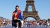 Gold medalist in the men's singles tennis event Serbia's Novak Djokovic poses at the Champions Park at Trocadero during the Paris 2024 Olympic Games in Paris on Aug. 5, 2024. 