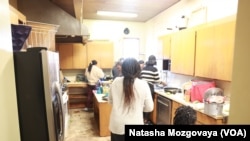 Asylum seekers from Africa cook in the chapel kitchen of Riverton Park United Methodist Church in Tukwila, Washington.