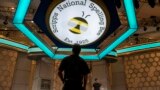 Crew members assemble the main stage ahead of the 2023 Scripps Nations Spelling Bee on May 28, 2023, at National Harbor in Oxon Hill, Md. 