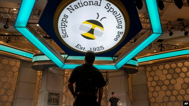 Crew members assemble the main stage ahead of the 2023 Scripps Nations Spelling Bee on May 28, 2023, at National Harbor in Oxon Hill, Md.