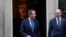Britain's former Prime Minister and newly appointed Foreign Secretary David Cameron walks outside 10 Downing Street next to top civil servant in the Foreign Office Philip Barton, in London, Britain, Nov. 13, 2023. 