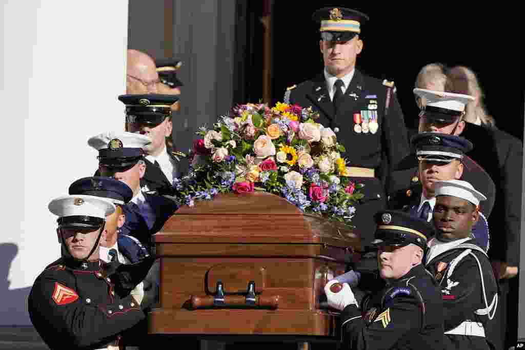 An Armed Forces body bearer team carries the casket of former U.S. first lady Rosalynn Carter after a tribute service at Glenn Memorial Church at Emory University, in Atlanta, Georgia.