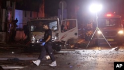 Israeli police work at the scene of a bomb explosion in Tel Aviv, Aug. 18, 2024. 