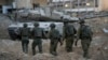 FILE — Israeli soldiers participate in a ground operation in the Gaza Strip, Nov. 8, 2023. Israel Prime Minister Benjamin Netanyahu said the Palestinian Authority will not govern Gaza after the war. 