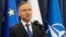 FILE - Poland's President Andrzej Duda gives a statement to the media in Warsaw, Poland, Jan. 10, 2024. Poland’s president is calling on other other members of the NATO alliance to raise their spending on defense to 3% of their GDP.