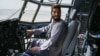 FILE - A Taliban fighter sits in an Afghan air force aircraft in Kabul, Aug. 31, 2021. The U.S. has given to Uzbekistan possession of aircraft that former Afghan air force personnel flew to Uzbekistan after the Taliban takeover.