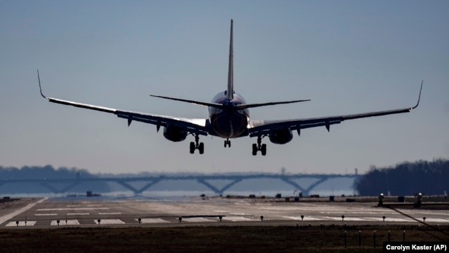 FILE - A Southwest plane lands at Ronald Reagan Washington National Airport in Arlington, Va., Dec. 30, 2022. (AP Photo/Carolyn Kaster, File)