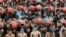Students from the Swaminarayan Gurukul school take part in a 'Magh Snan' or holy bath in Ahmedabad, India, Jan. 24, 2024.